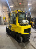 2021 HYSTER H60FT 6000 LB LP GAS FORKLIFT PNEUMATIC 89/188" 3 STAGE MAST SIDE SHIFTING FORK POSITIONER ENCLOSED CAB LP GAS 991 HOURS PLUMBED 4 WAYS TO THE CARRIAGE STOCK # BF9184129-BUF