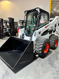2023 BOBCAT S740 SKID STEER 654 HOURS 3100 LB CAPACITY DIESEL PNEUMATIC TIRES ENCLOSED HEATED CAB AUXILLARY HYDRAULICS 55" INDUSTRIAL BUCKET BF9243499-BUF